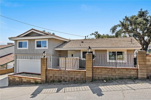 33340 Gisborne Way, Lake Elsinore, CA 92530 - view of front of property with a fenced front yard, a garage, stucco siding, and a tile roof