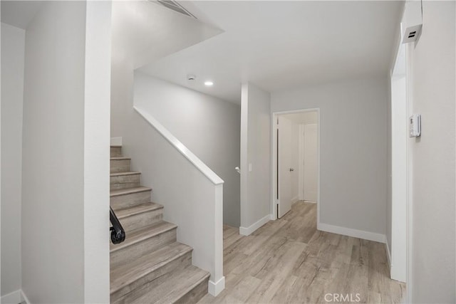 33340 Gisborne Way, Lake Elsinore, CA 92530 - stairway featuring wood finished floors and recessed lighting