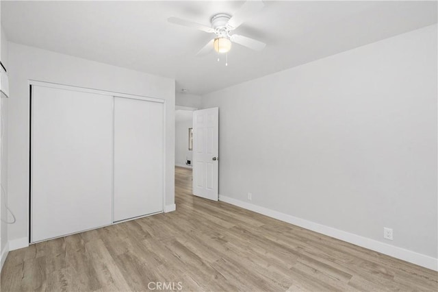 33340 Gisborne Way, Lake Elsinore, CA 92530 - unfurnished bedroom with wood finished floors, a closet, and baseboards