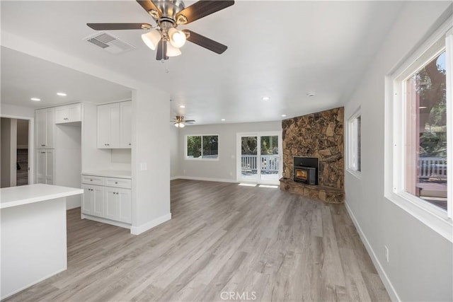 33340 Gisborne Way, Lake Elsinore, CA 92530 - unfurnished living room featuring a ceiling fan, light wood-style flooring, recessed lighting, baseboards, and a fireplace