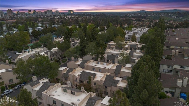 aerial view at dusk with a residential view