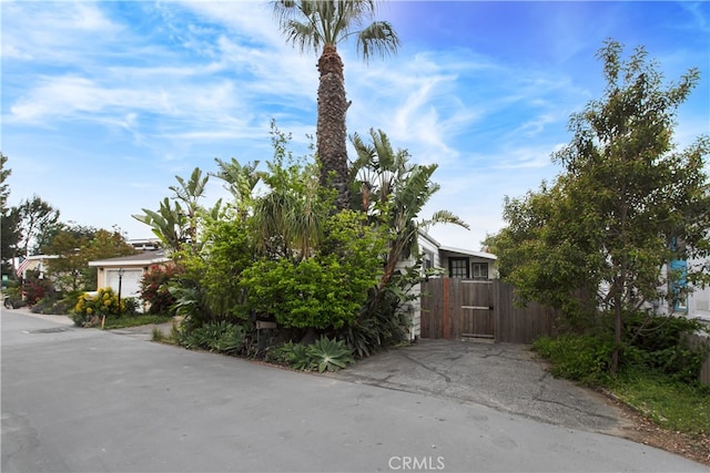 1145 Apache, Topanga, CA 90290 - obstructed view of property featuring a gate and fence