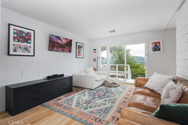 1145 Apache, Topanga, CA 90290 - living area featuring wood finished floors and wood walls
