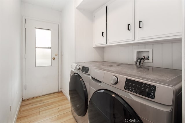 1145 Apache, Topanga, CA 90290 - clothes washing area with cabinet space, independent washer and dryer, and light wood-type flooring
