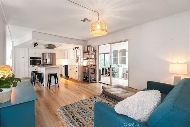1145 Apache, Topanga, CA 90290 - living room with light wood-type flooring