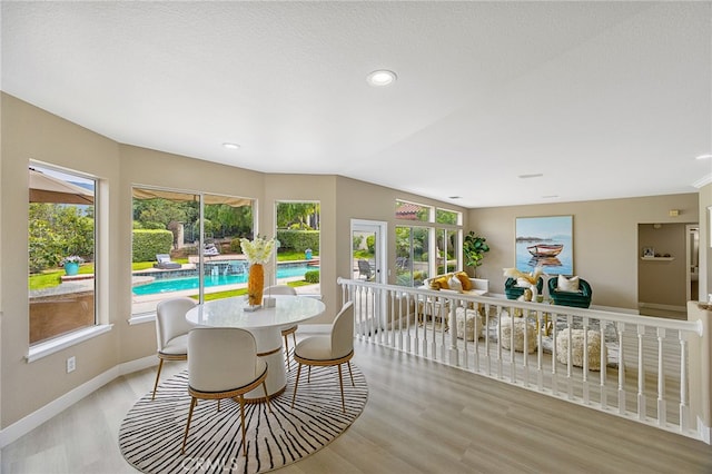 sunroom featuring a healthy amount of sunlight