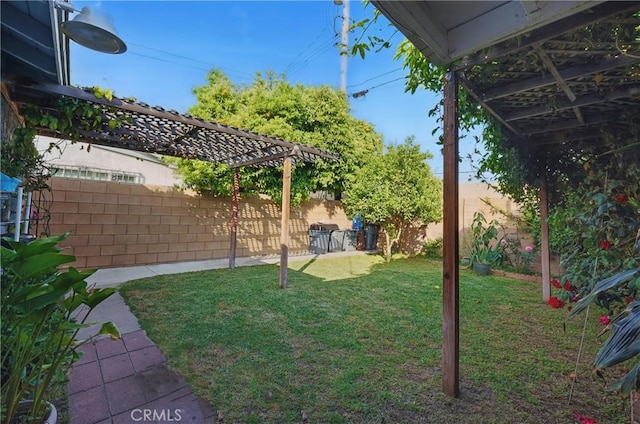 view of yard with a fenced backyard