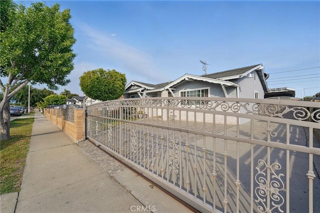 exterior space featuring a gate and fence