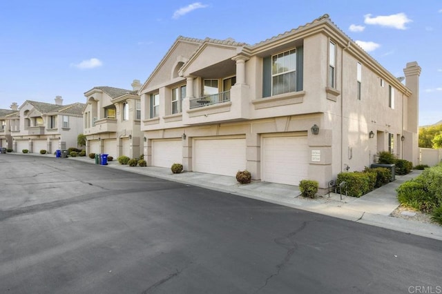 18562 Caminito Pasadero, San Diego, CA 92128 - exterior space with stucco siding, a residential view, and a garage