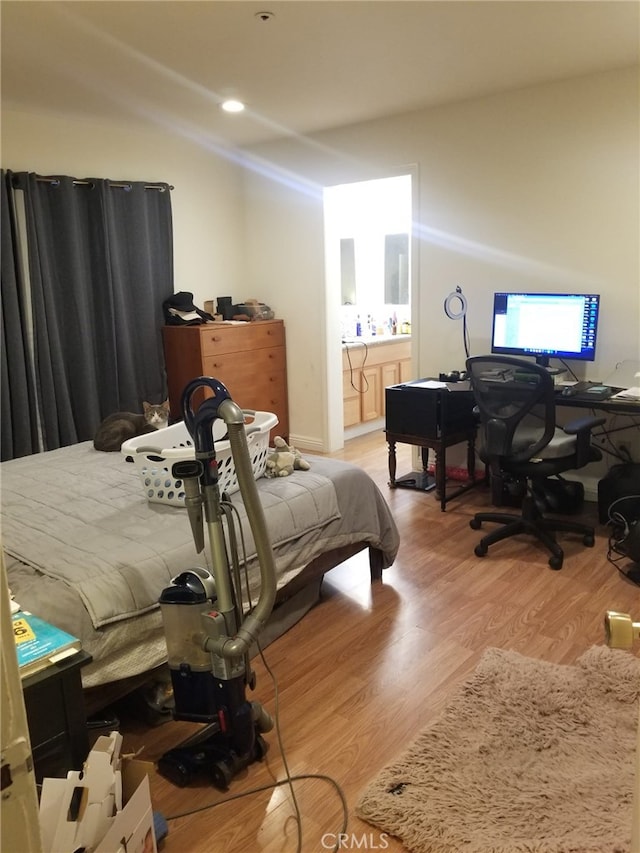 426 N Maryland Ave Unit 103, Glendale, CA 91206 - bedroom featuring light wood finished floors and ensuite bath