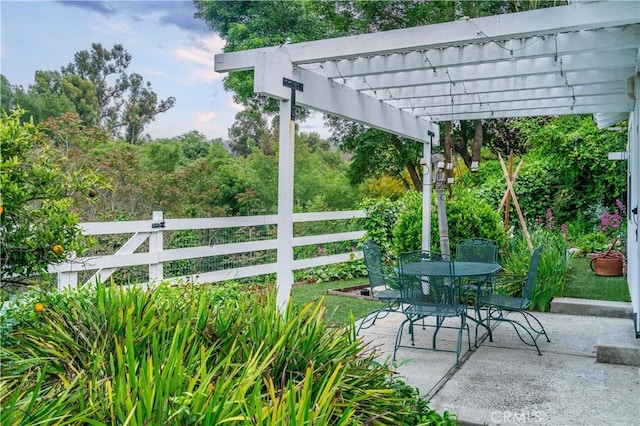 9 Middleridge Ln N, Rolling Hills, CA 90274 - view of patio / terrace with outdoor dining space, a pergola, and fence