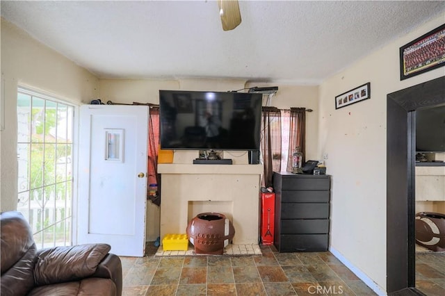 1341 N Fries, Wilmington, CA 90744 - living area featuring baseboards and stone finish floor
