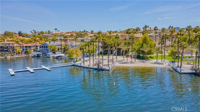 view of dock featuring a water view and a residential view