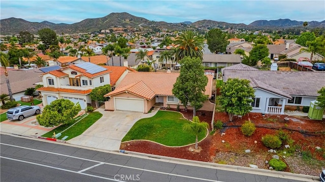 drone / aerial view with a mountain view and a residential view