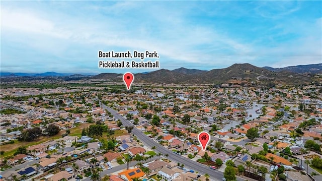 birds eye view of property with a residential view and a mountain view