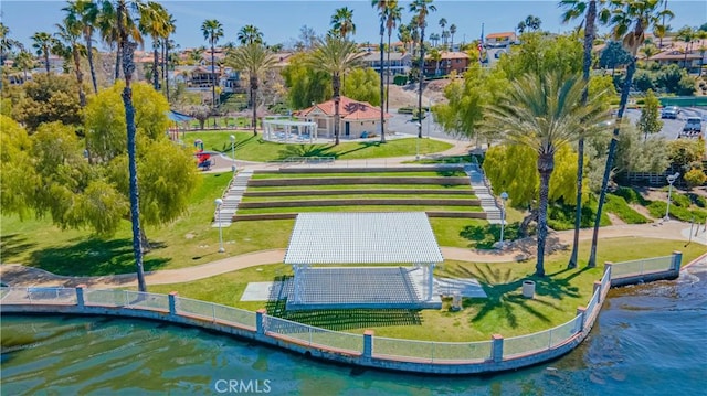 view of community with a water view