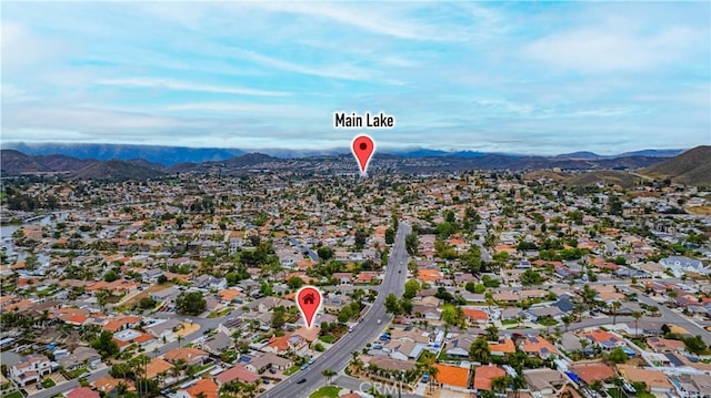 bird's eye view with a mountain view and a residential view