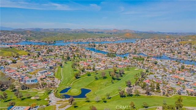 birds eye view of property with a residential view and a water and mountain view