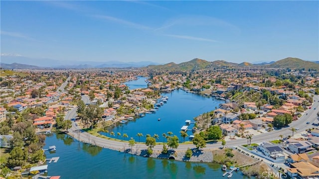 bird's eye view featuring a water and mountain view and a residential view