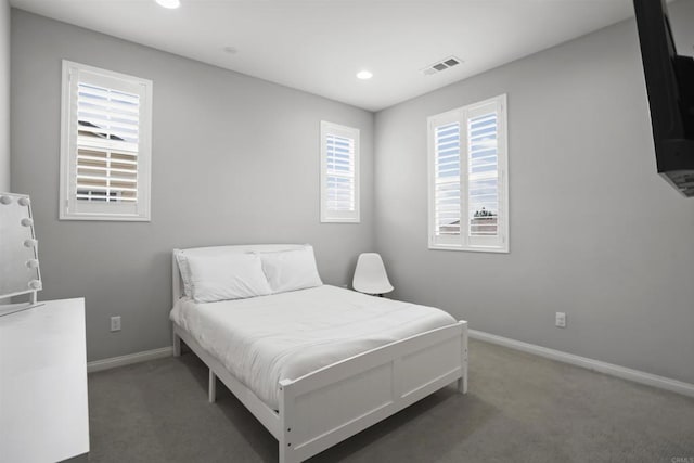 bedroom featuring carpet, visible vents, baseboards, and recessed lighting