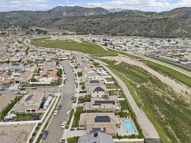 aerial view with a mountain view and a residential view