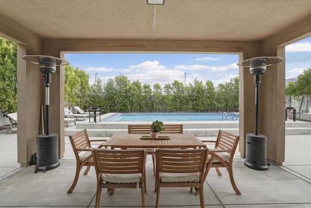 view of patio / terrace featuring a fenced in pool