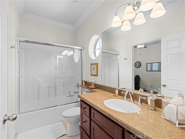 full bath featuring toilet, ornamental molding, vanity, enclosed tub / shower combo, and a chandelier