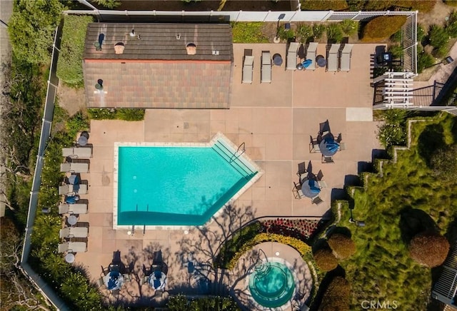 view of subject property featuring a pool area