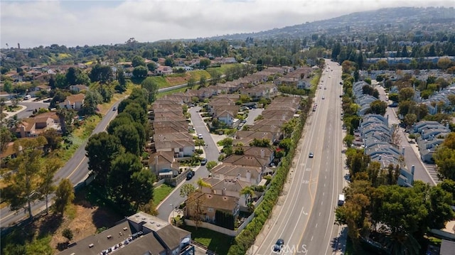 view of property location with a highway and nearby suburban area