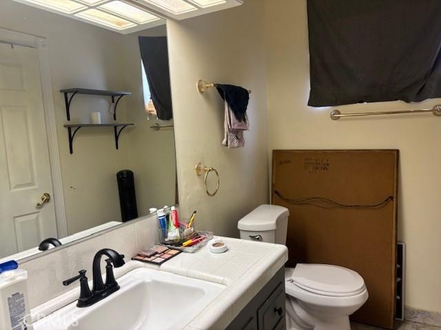 56819 Mountain View Trl, Yucca Valley, CA 92284 - bathroom featuring toilet and vanity