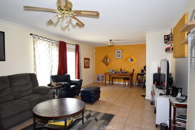 living room with ornamental molding, ceiling fan, and light tile patterned flooring