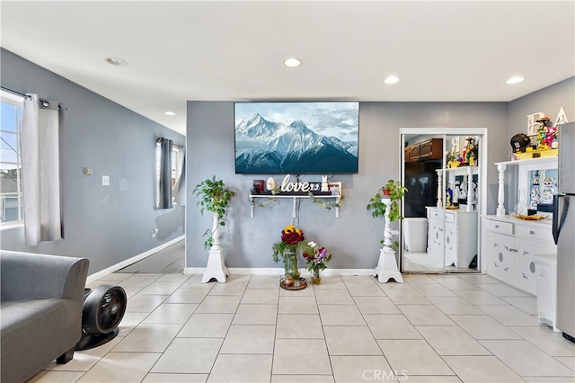 1301 E Pacific Coast, Wilmington, CA 90744 - living room featuring recessed lighting, baseboards, and light tile patterned flooring