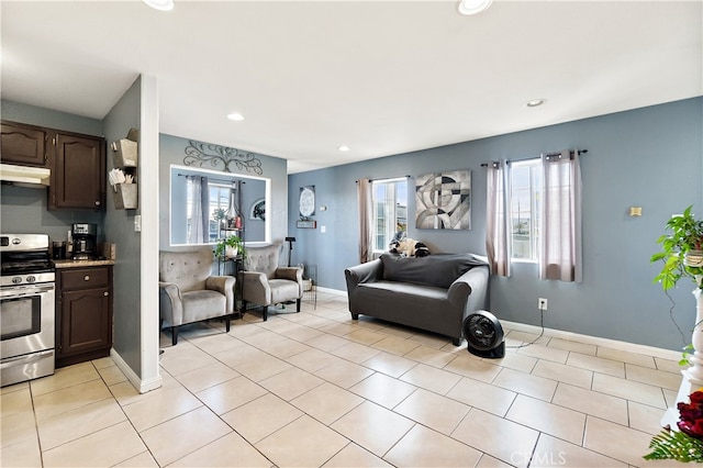 1301 E Pacific Coast, Wilmington, CA 90744 - living room featuring recessed lighting, light tile patterned floors, and baseboards