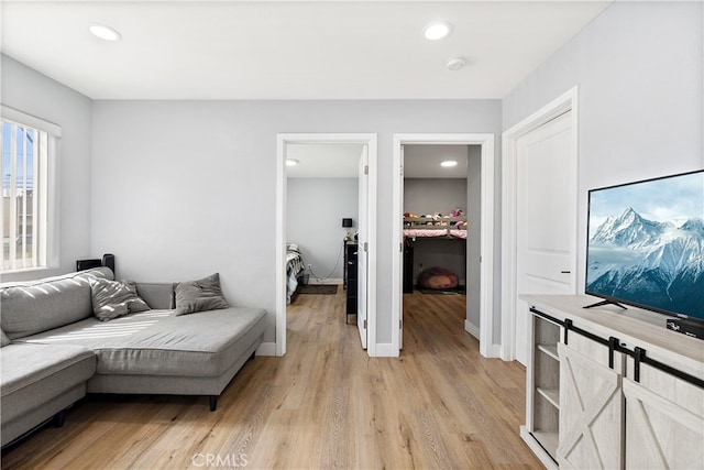 1301 E Pacific Coast, Wilmington, CA 90744 - living room with light wood finished floors, recessed lighting, and baseboards