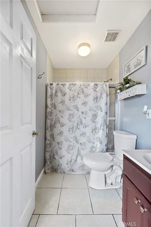 1301 E Pacific Coast, Wilmington, CA 90744 - full bathroom featuring a shower with shower curtain, toilet, vanity, and tile patterned floors