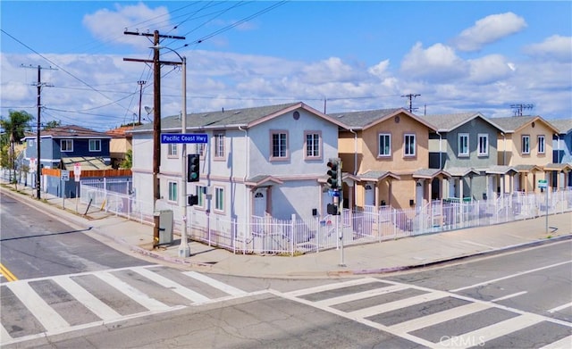 1301 E Pacific Coast, Wilmington, CA 90744 - multi unit property with stucco siding, fence, and a residential view
