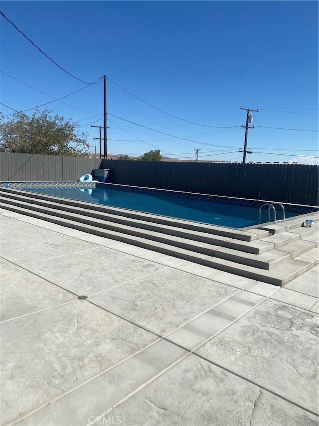 631 Chateau Way, Barstow, CA 92311 - view of swimming pool with a fenced in pool and fence