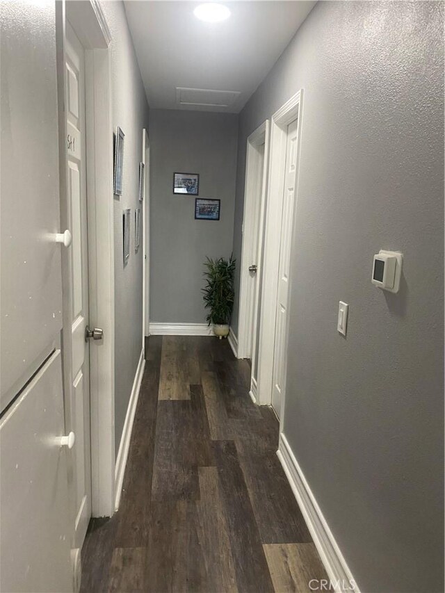 631 Chateau Way, Barstow, CA 92311 - hallway featuring baseboards and wood finished floors