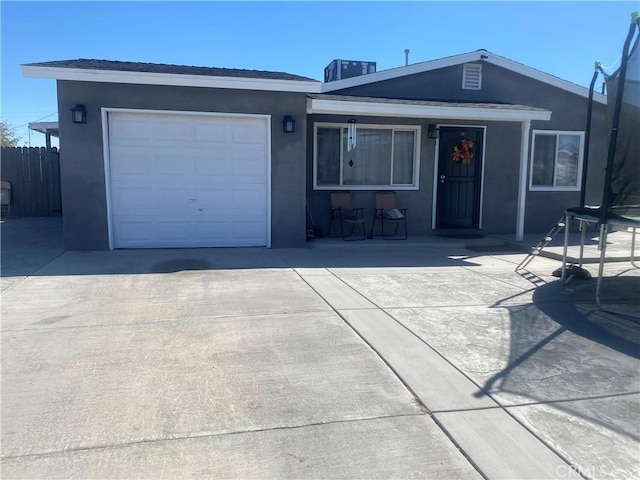 631 Chateau Way, Barstow, CA 92311 - single story home featuring driveway, stucco siding, an attached garage, and fence