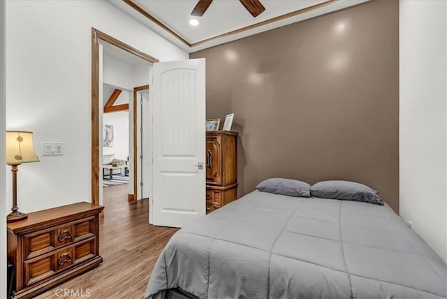 bedroom featuring a ceiling fan, recessed lighting, and wood finished floors