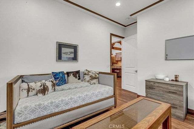bedroom featuring recessed lighting, baseboards, and wood finished floors