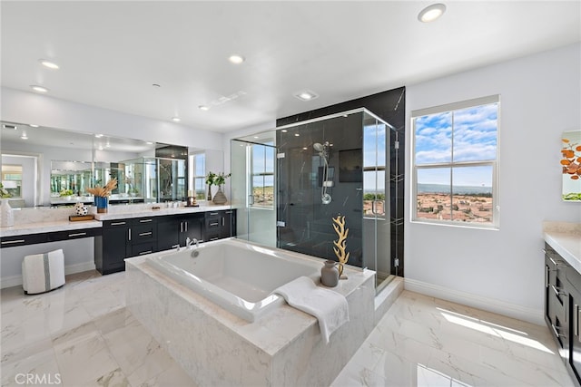 109 Chronology, Irvine, CA 92618 - bathroom with vanity, baseboards, marble look tile flooring, a stall shower, and recessed lighting