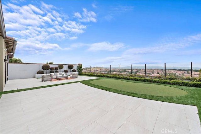 109 Chronology, Irvine, CA 92618 - view of patio / terrace featuring a putting green, fence, and outdoor lounge area
