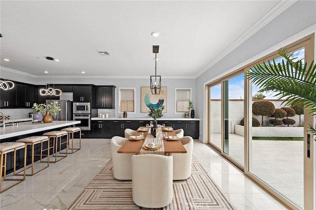 109 Chronology, Irvine, CA 92618 - dining area featuring light marble finish flooring, ornamental molding, and recessed lighting