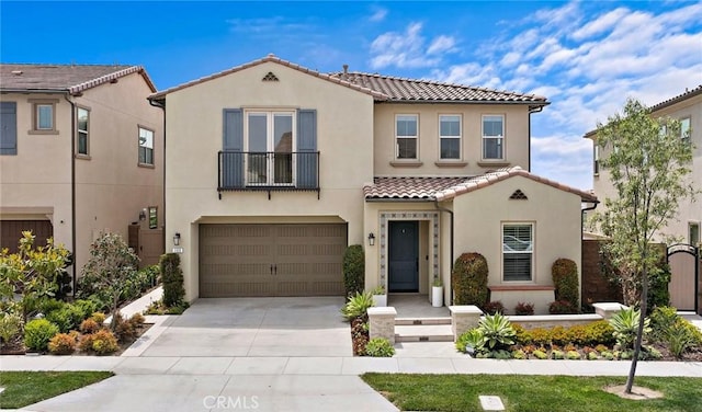 109 Chronology, Irvine, CA 92618 - view of front of property featuring a tiled roof, stucco siding, a garage, concrete driveway, and a balcony