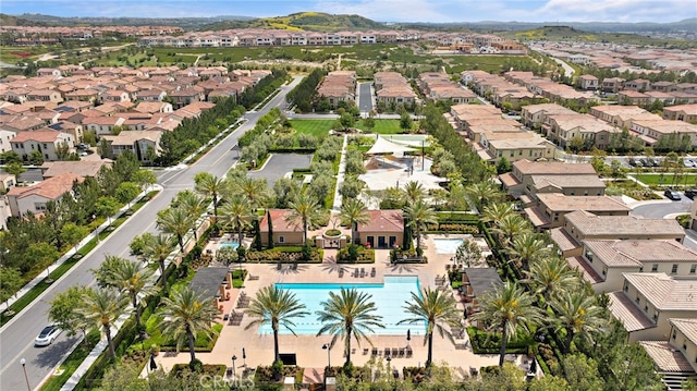 109 Chronology, Irvine, CA 92618 - aerial view of property's location featuring a pool area and nearby suburban area