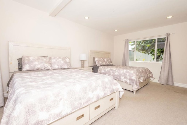 bedroom featuring light carpet and recessed lighting