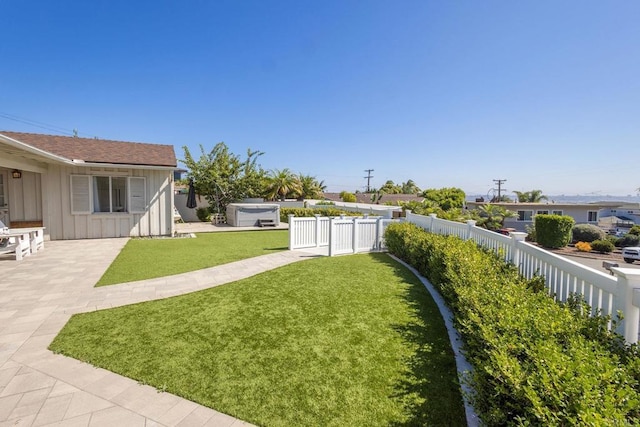 view of yard with fence and a patio area