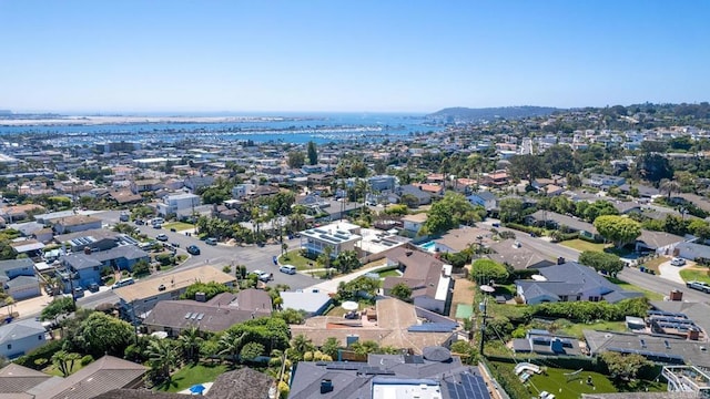 birds eye view of property featuring a water view and a residential view
