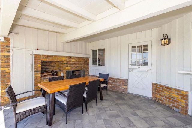 view of patio featuring outdoor dining area